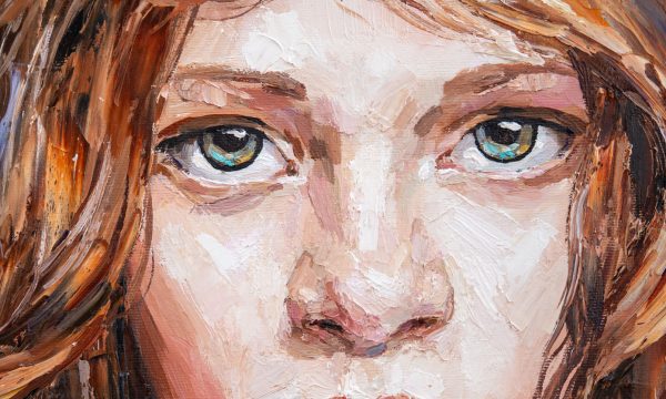 Close-up portrait of a red-haired girl. A woman with a large head of curly hair. Oil painting on canvas. Close-up portrait of a red-haired girl. A woman with a large head of curly hair. Oil painting on canvas.